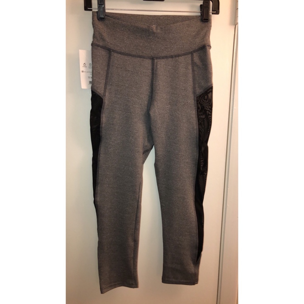 NEW grey leggings with shear sides & small pocket.